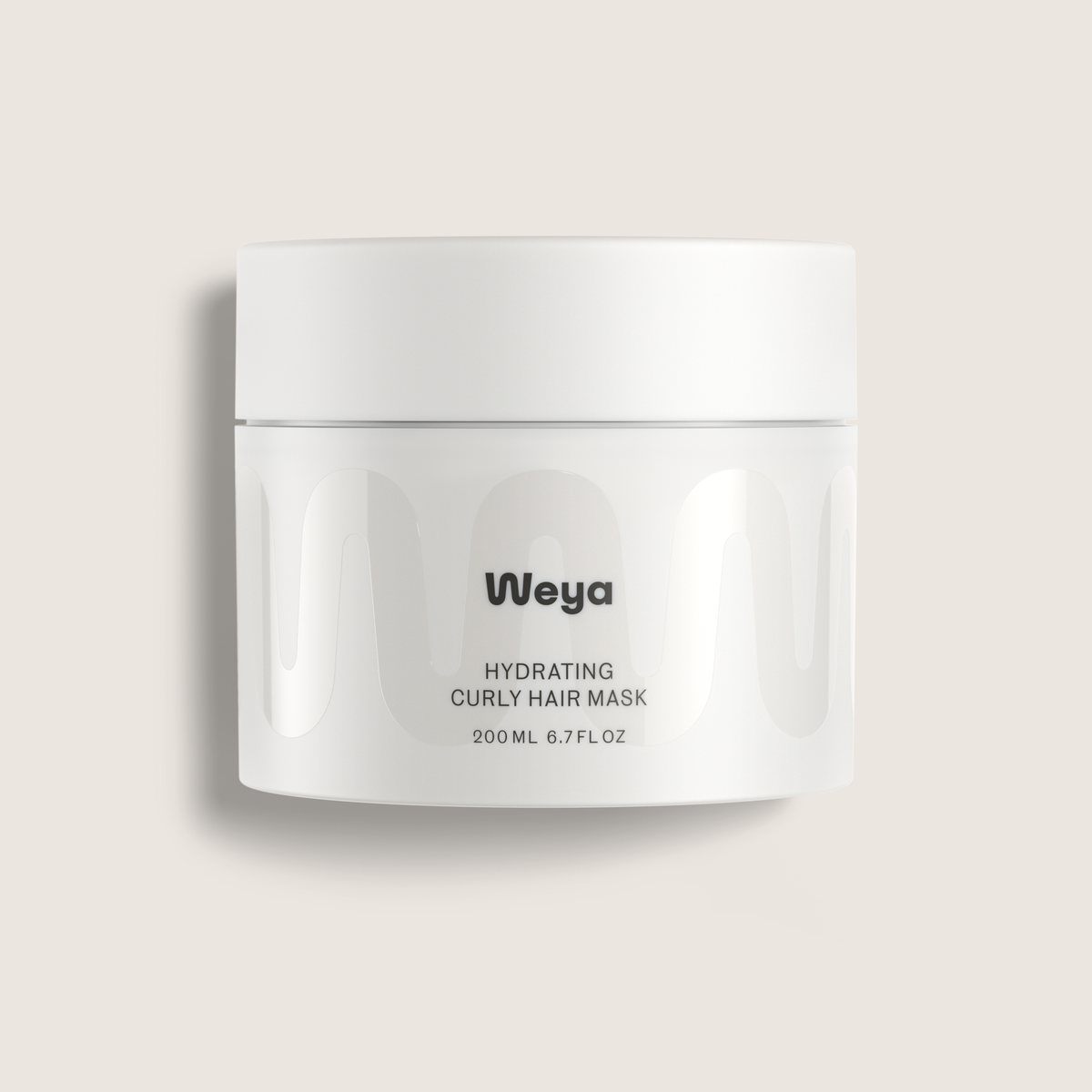 A white plastic jar of Weya Hydrating Curly Hair Mask on a light beige background.